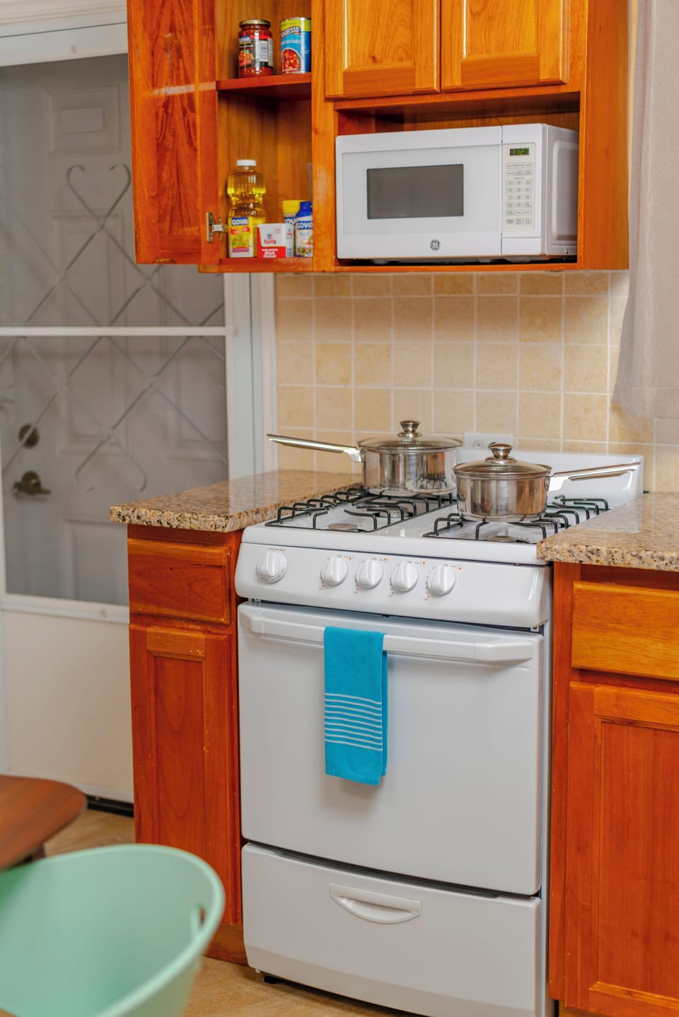 Full kitchen perfect for short or longer stays and home-style comfort