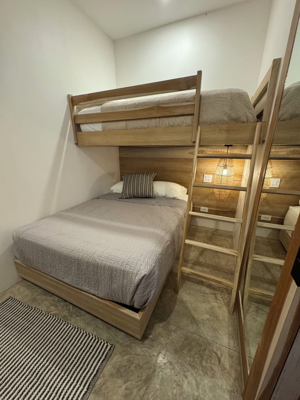 Full bed with Twin bunk above, A/C, closet and desk