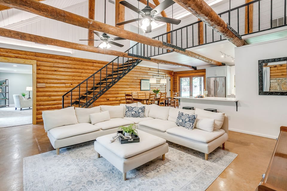 The open-concept design flows seamlessly into the kitchen and dining areas.
