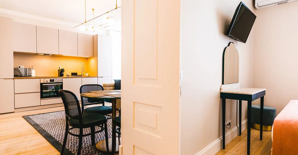 Cook effortlessly in the sleek kitchen with warm, glowing ambience
