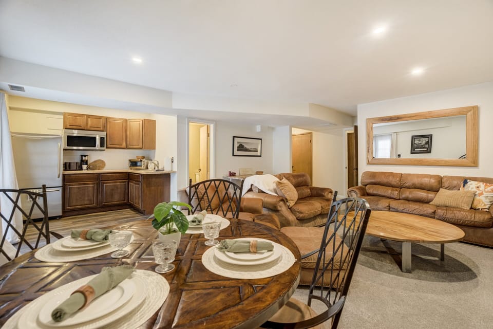 Beautiful open flow concept between the kitchenette, dining area, and living room in this walkout basement apartment.