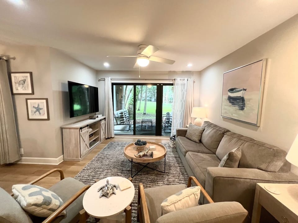 Kick back in style with comfortable seating and calming coastal tones.
