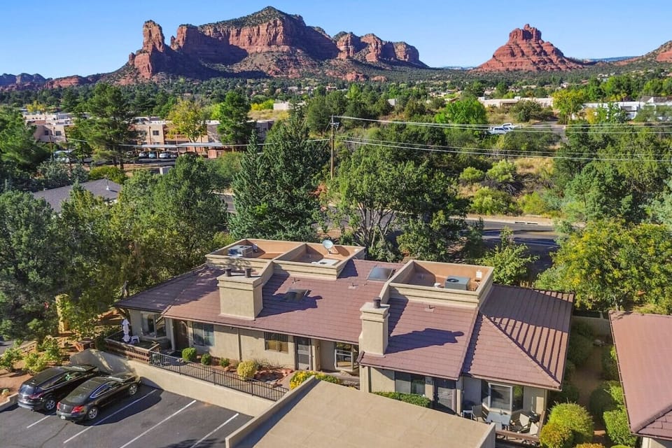 The home is near many red rock formations