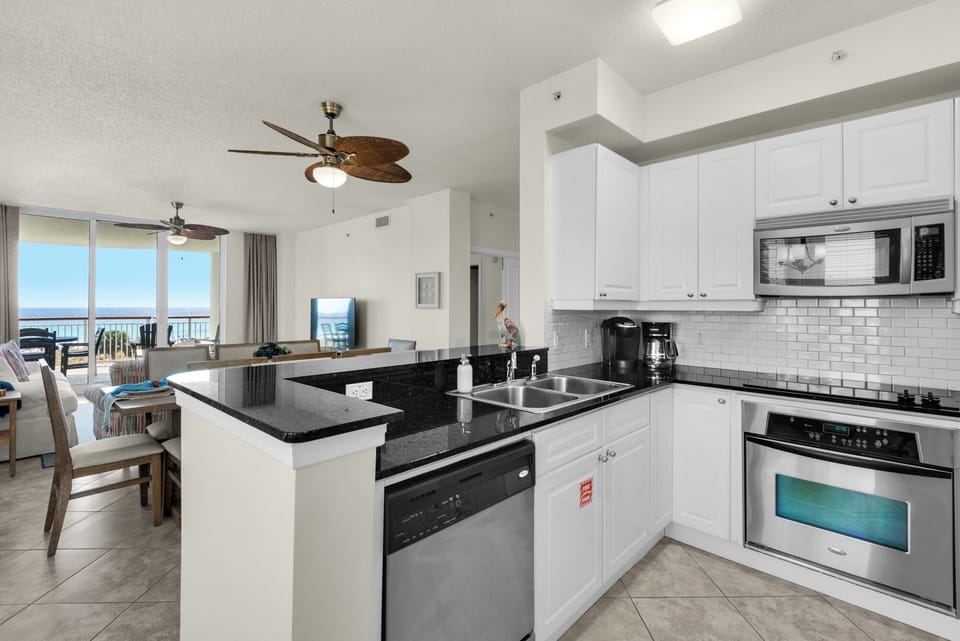 Kitchen, Dining Room, Living Room, and Balcony 