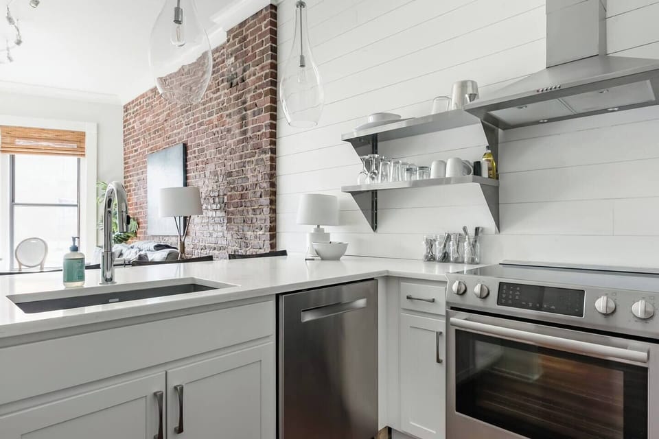 Fully equipped kitchen with modern appliances.