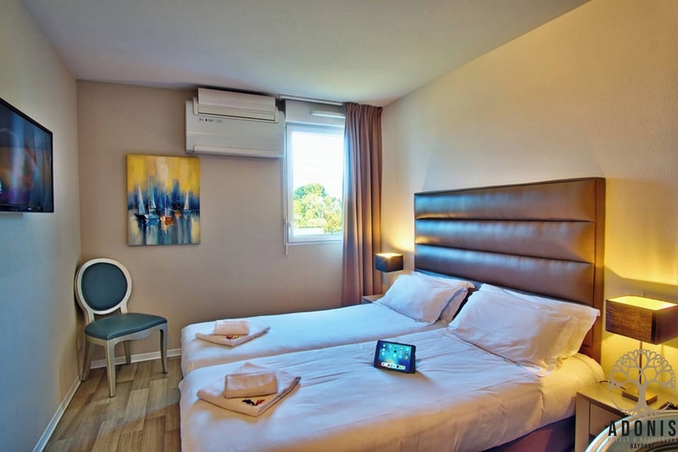 Settle into a bright, comfortable room with modern touches.