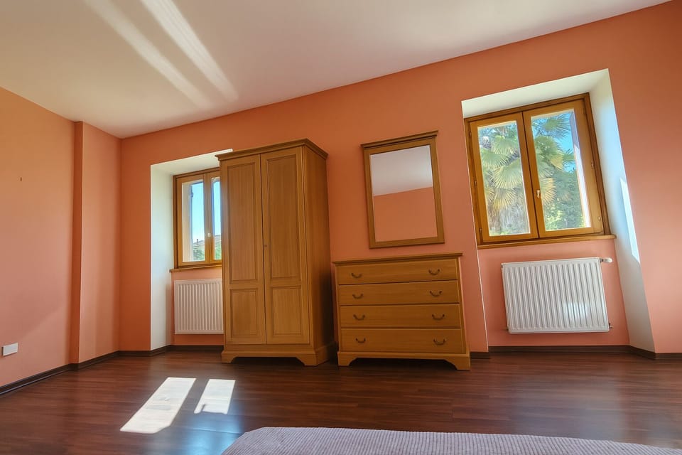 Master bedroom windows and storage
