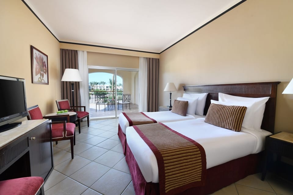 Settle into twin comfort and step out to the balcony.