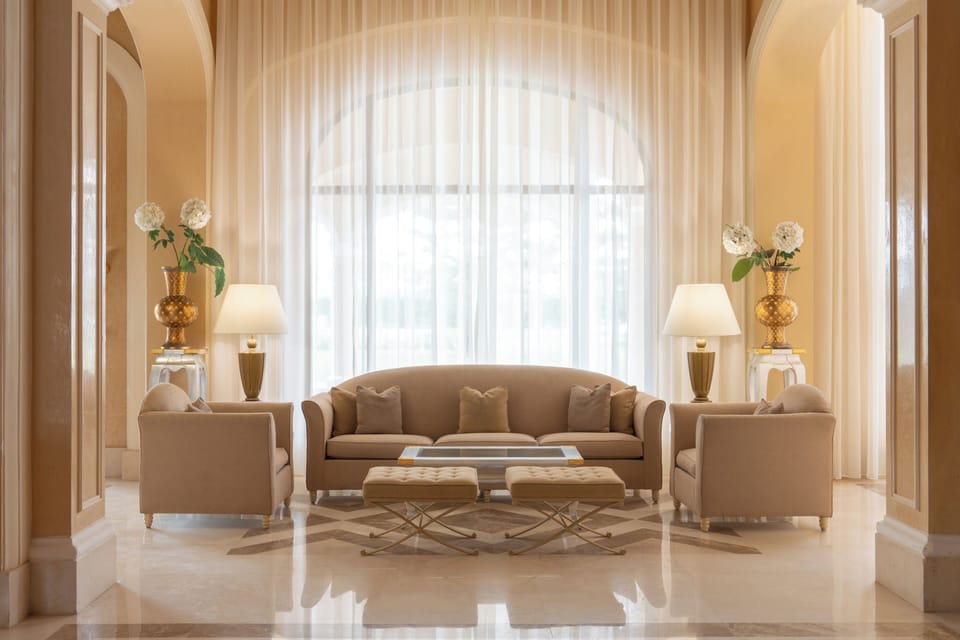 Settle into a serene lounge for cool, quiet relaxation.