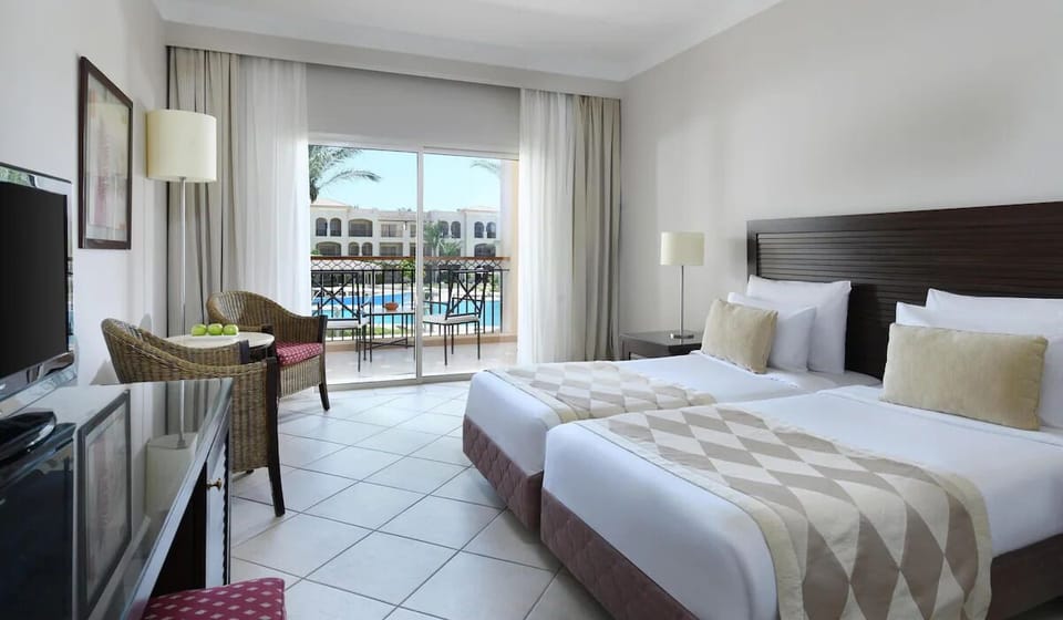 Settle into twin comfort with an airy balcony outlook.
