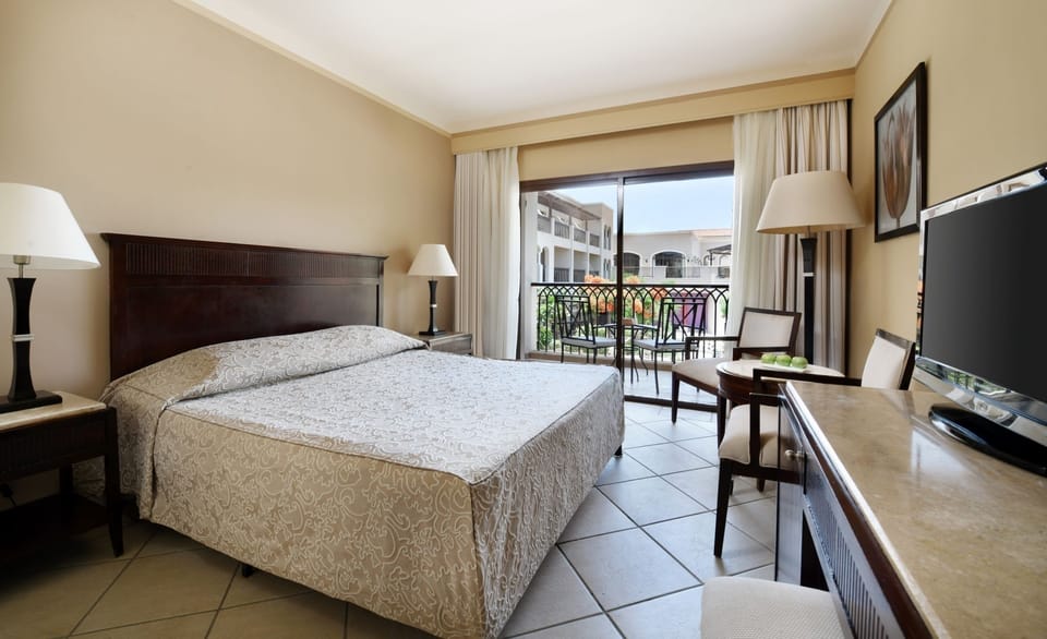 Drift off in a calm room with balcony views.