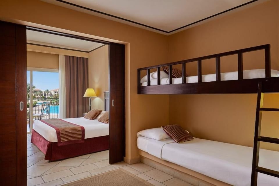 Settle in together with bunks, cozy bedding, and balcony views.