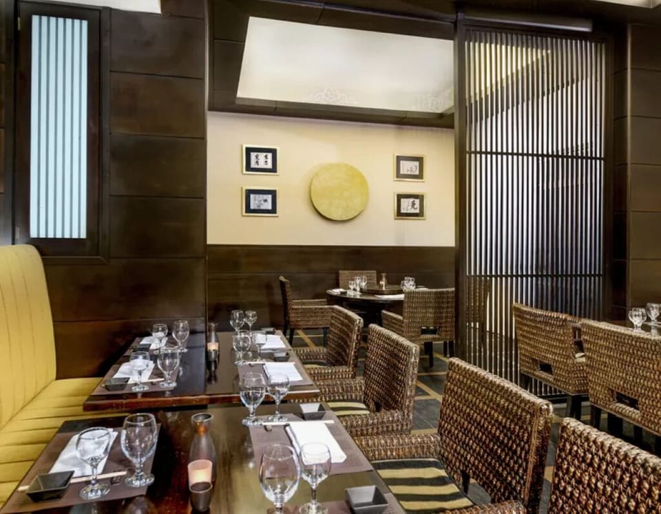 Toast special nights in a cozy, softly lit dining nook.