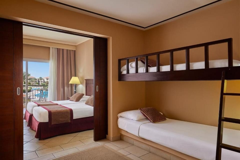Unwind in a bright family suite with extra sleeping space.