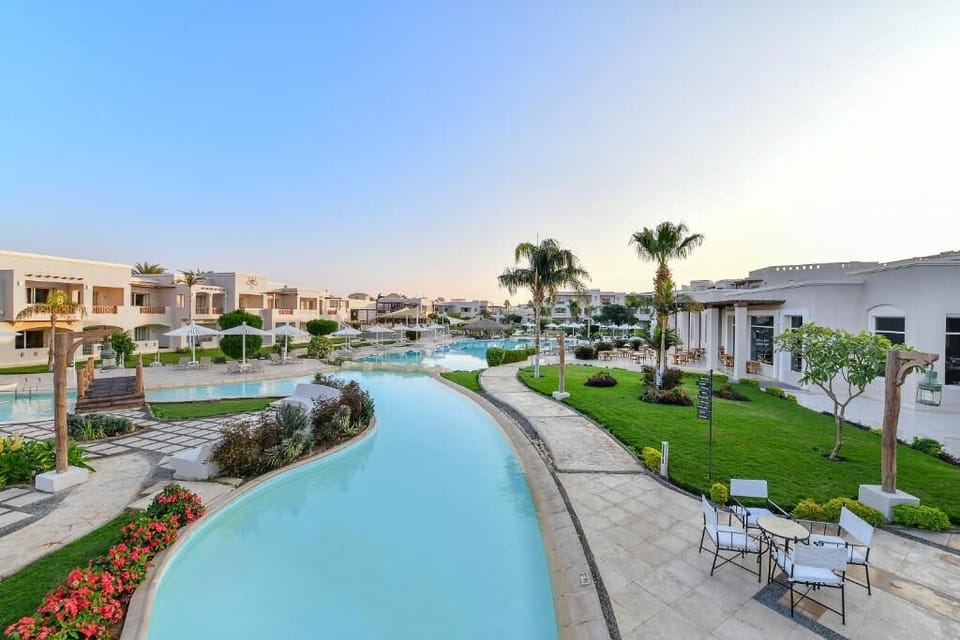 Drift leisurely along the serene lagoon-style pool pathway.