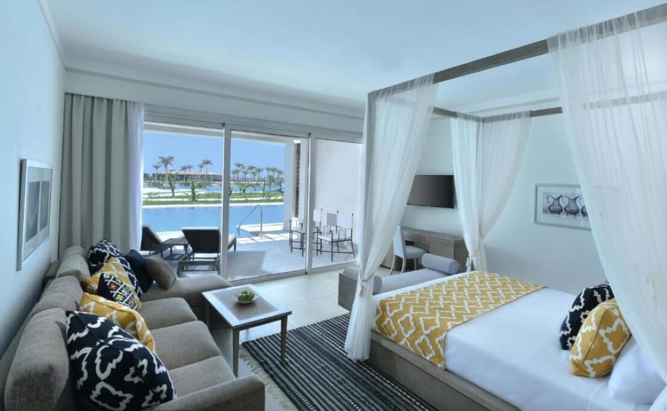 Sink into the sofa and watch the water sparkle outside.