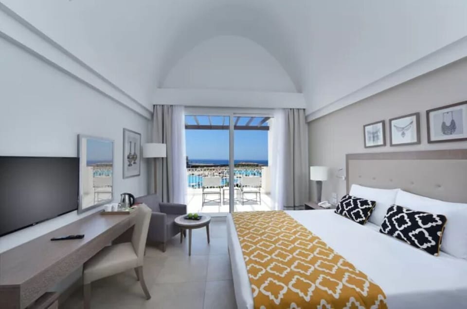 Sip coffee by the balcony as the ocean glitters outside.