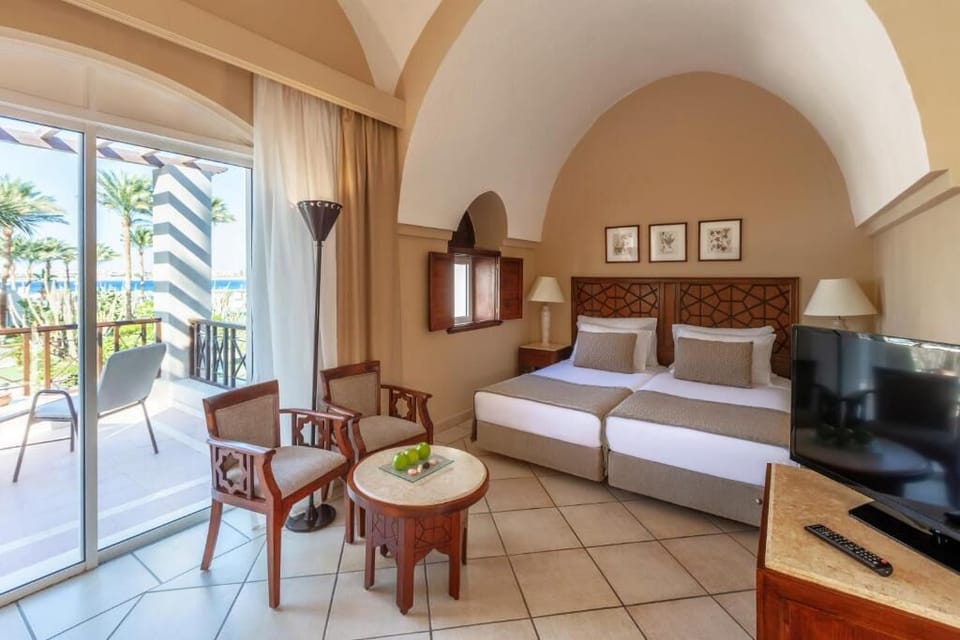 Wake up to sunlit comfort steps from your private balcony.