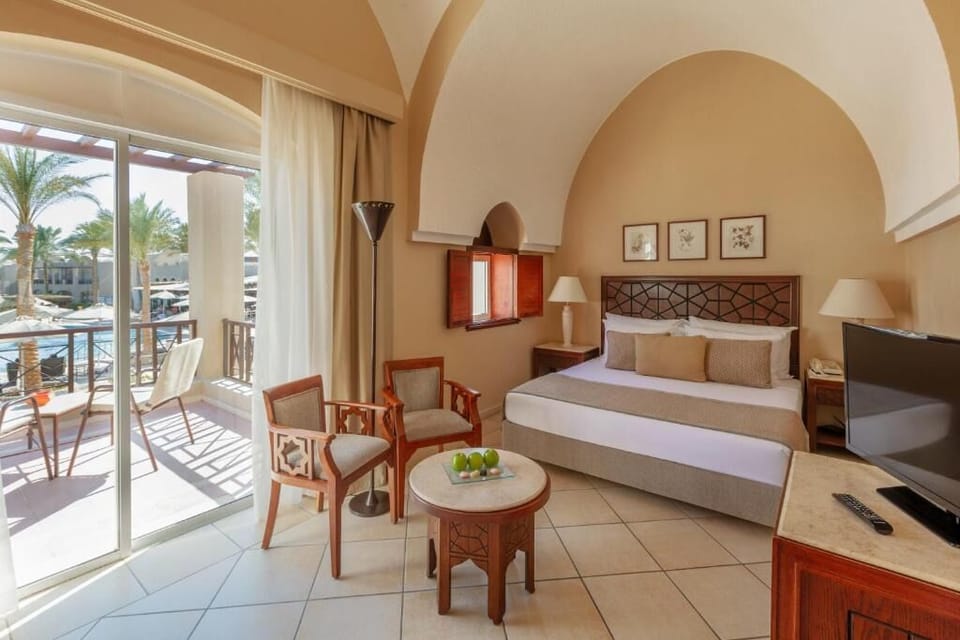 Wake up to airy comfort with balcony views and morning light.