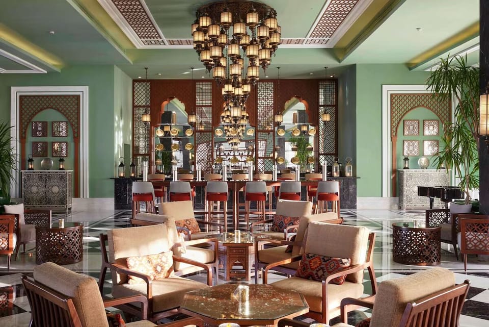 Arrive in style beneath lantern-lit ceilings and plush seating.