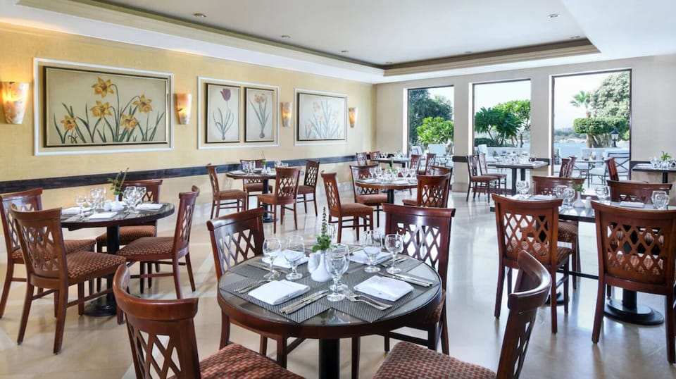 Enjoy leisurely breakfasts in a sunlit dining room with views.