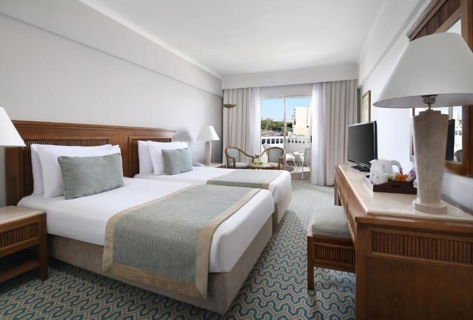 Settle into twin comfort and plan tomorrow’s seaside adventures.