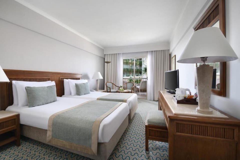 Sip a sunset drink just steps from your bed.