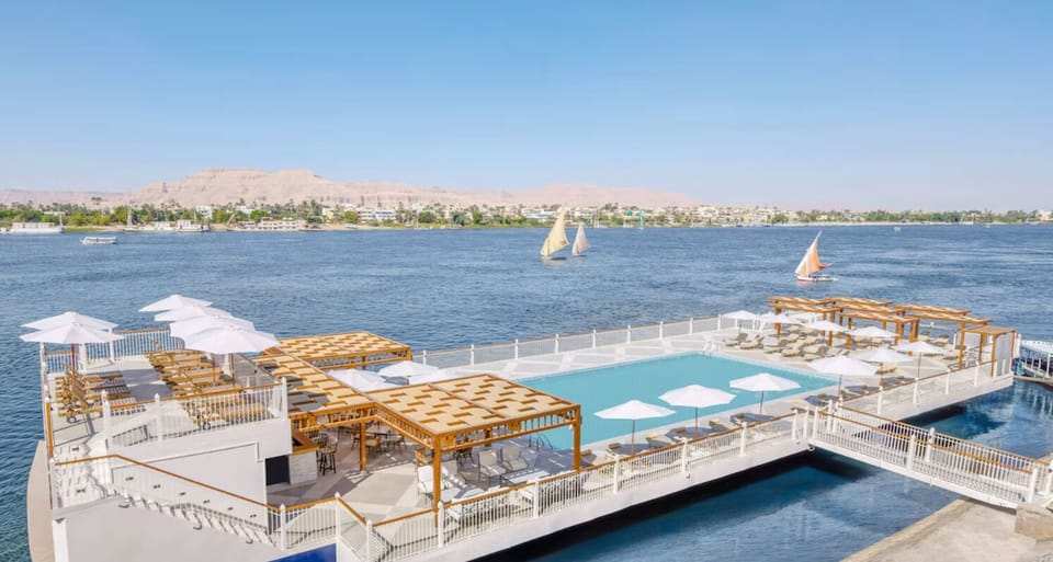 Float above the river on a chic pool deck.