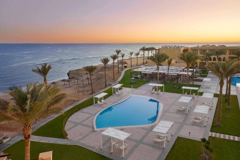 Soak up sunset skies and ocean breezes by the pool.