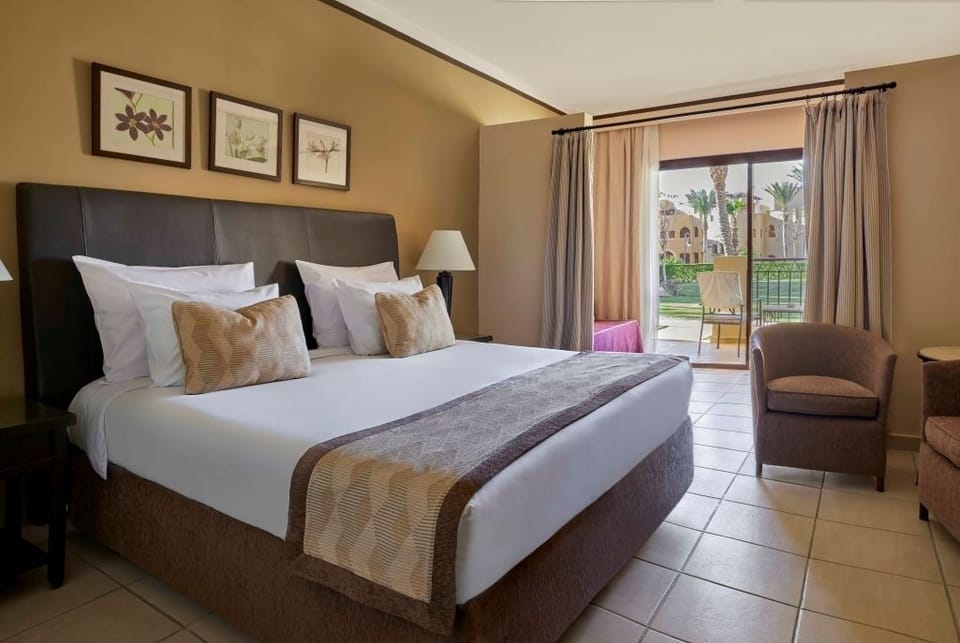 Relax in a serene twin room with soft neutral tones.