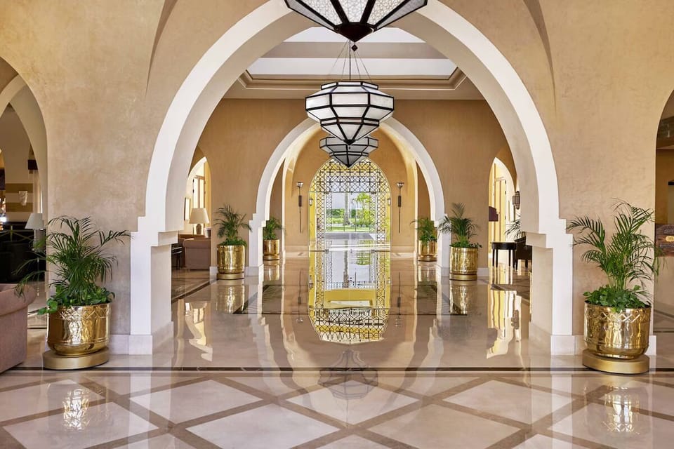 Step into soaring arches and glossy floors of grandeur.