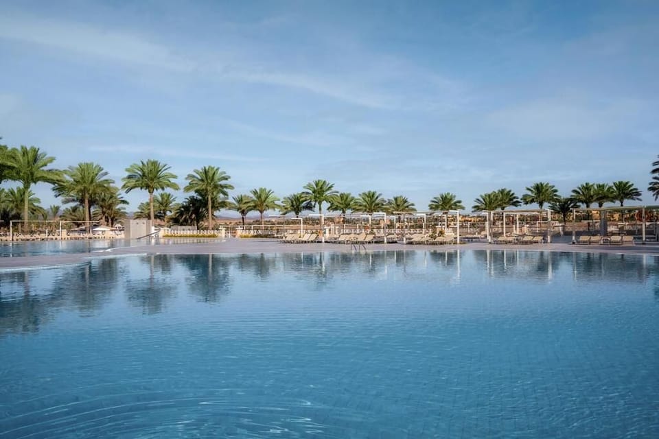 Float in crystal-blue water with endless space to relax.