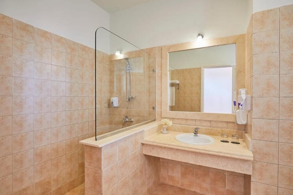 Step into a bright, tidy bath for easy mornings.
