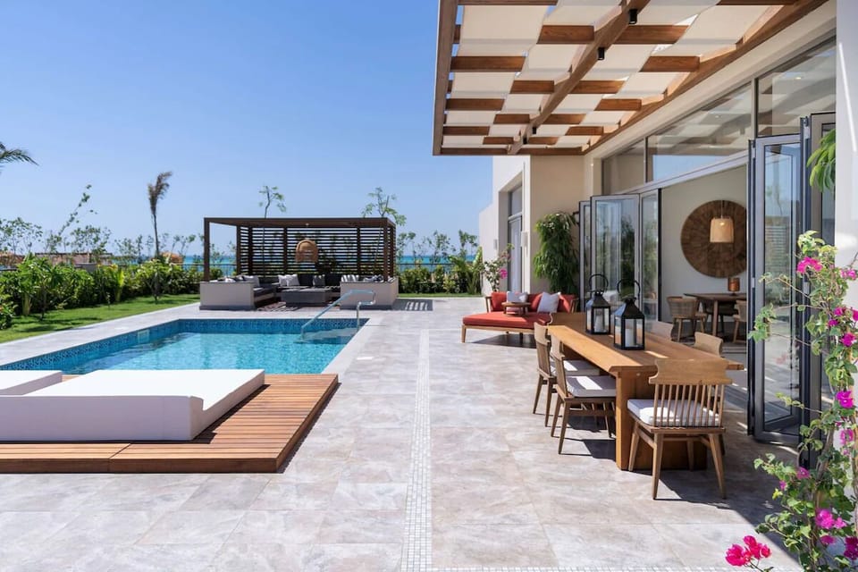 Soak in the sun beside your private pool terrace.