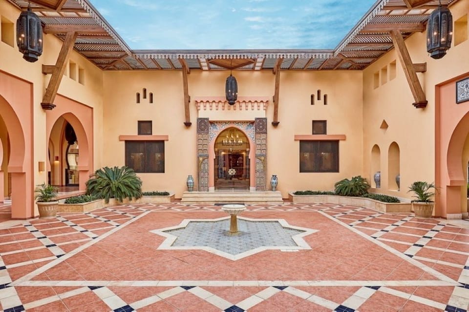 Arrive to a grand lobby with chandelier-lit Moroccan elegance.