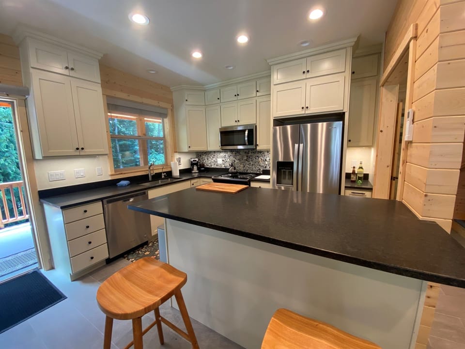 Full Chef inspired and stocked kitchen with state of the art brand new Whirlpool appliances.