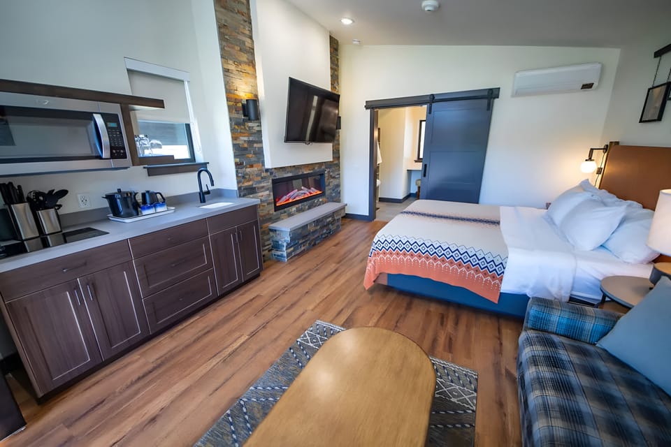Stretch out in your studio suite with cozy sitting area.
