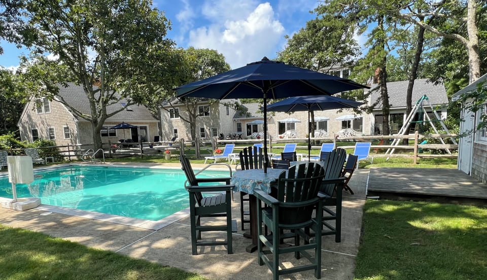 20´x40´ heated pool (available mid-May - September). Guest house is on the left.