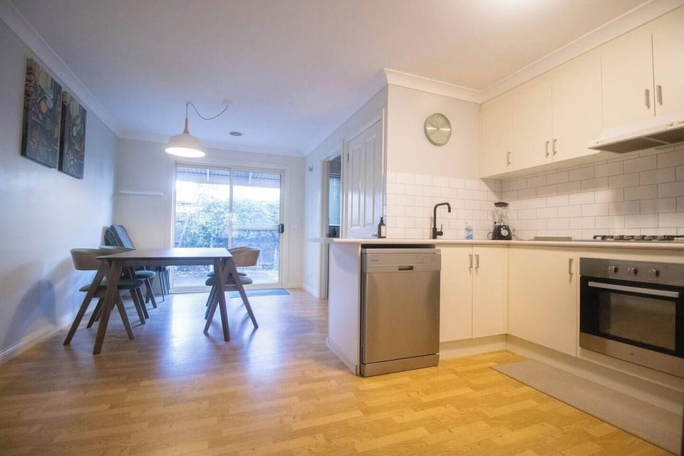 Kitchen & Dining: Bright space with modern appliances and a view for delightful meals together!
