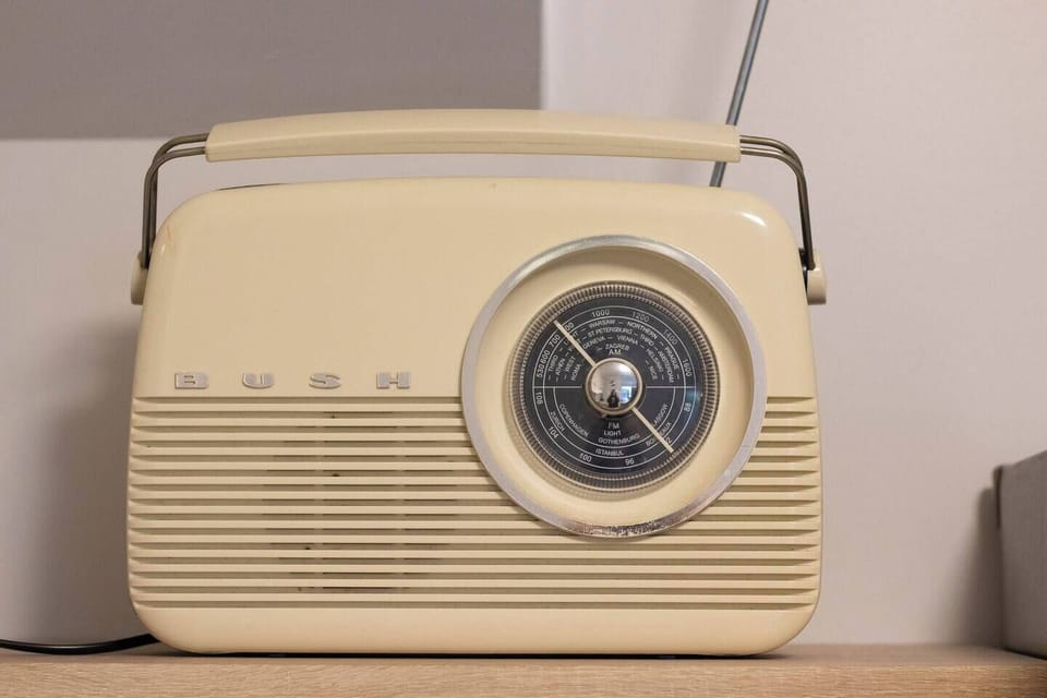 Retro Charm: Experience nostalgia with this vintage-inspired radio, a timeless touch for your stay!