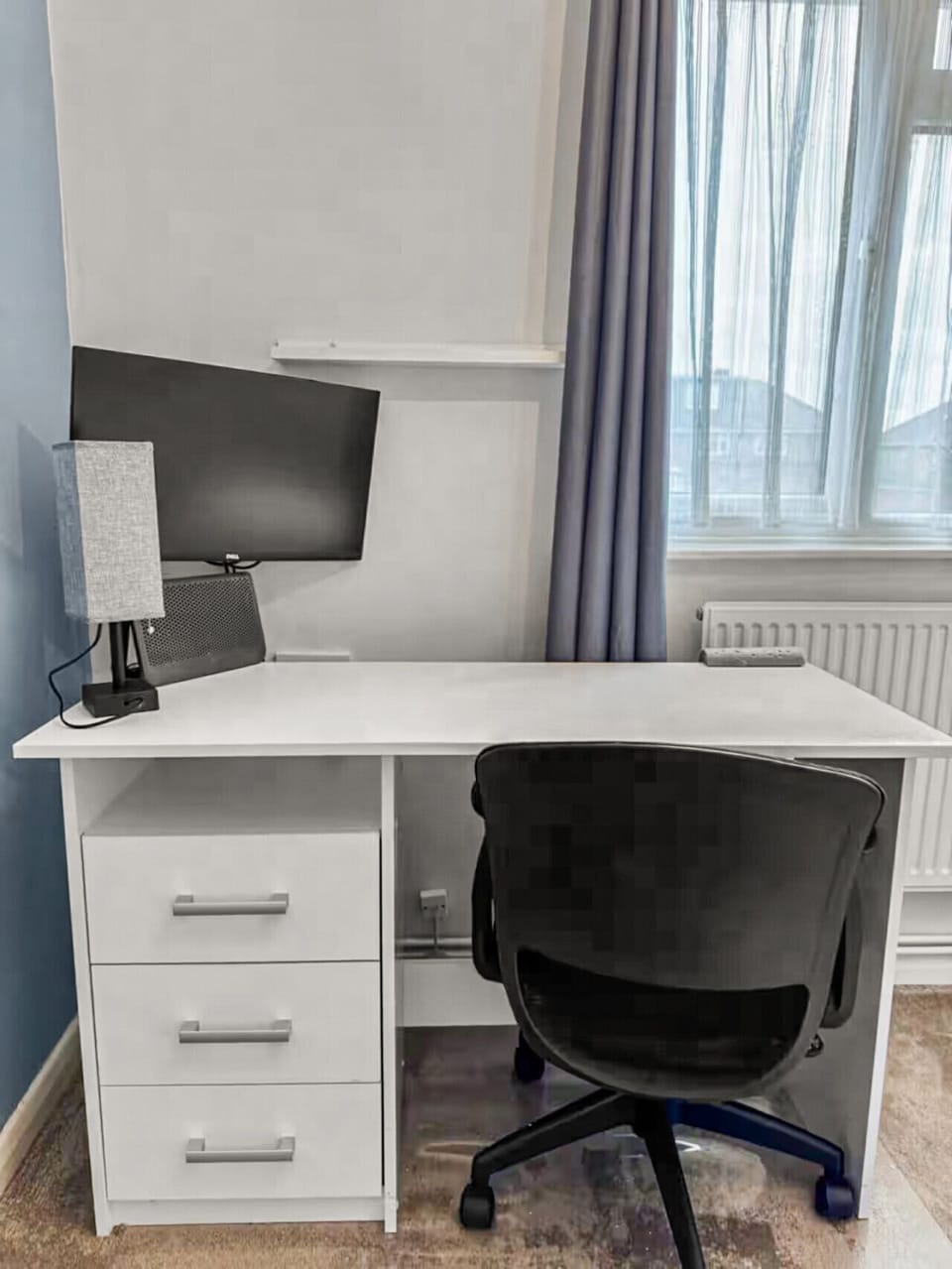 Dedicated workspace with monitor and chair