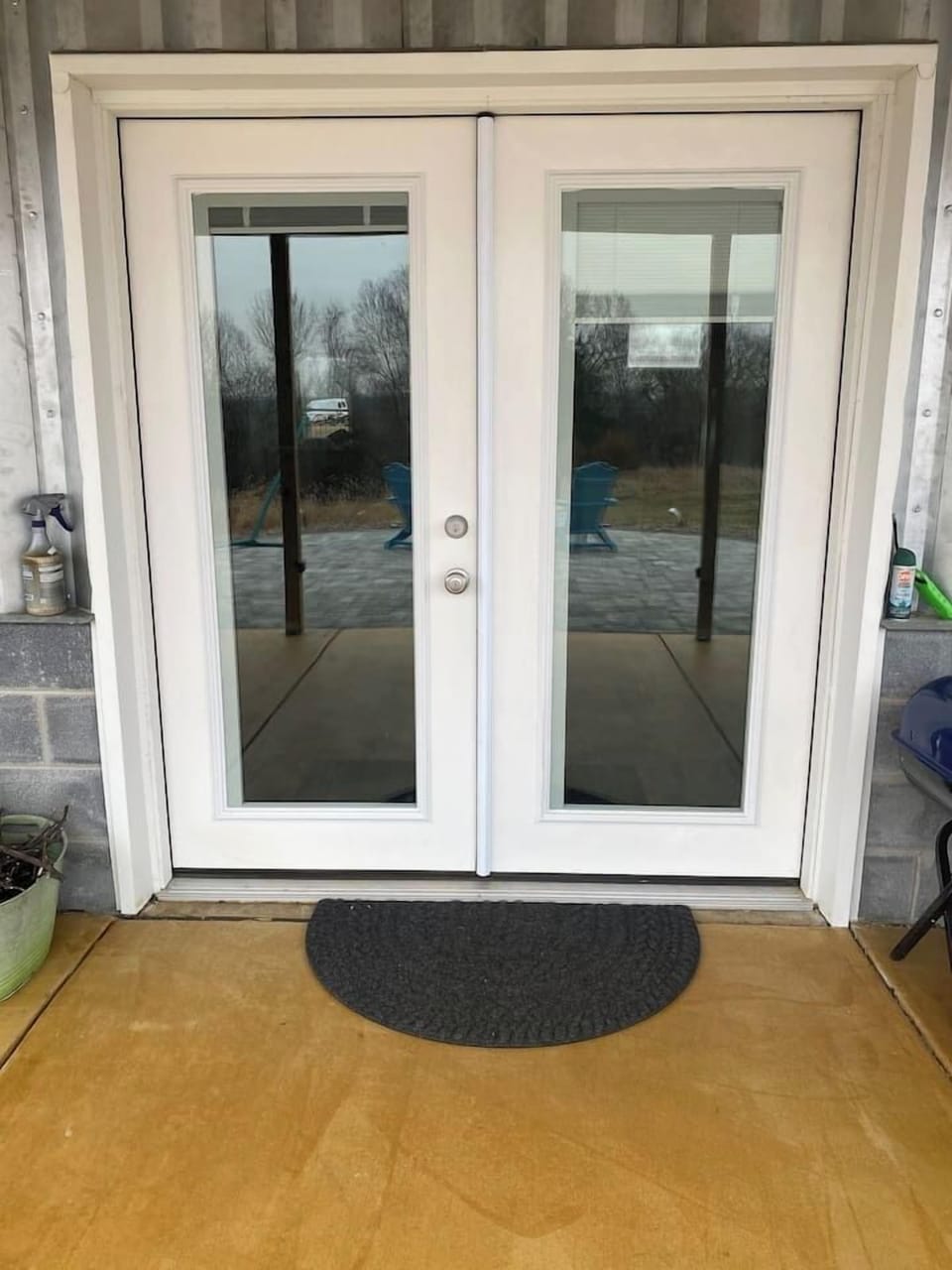 Detail of French doors from paver patio.