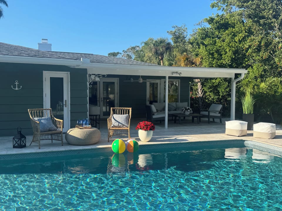 Relax by the pool in your private tropical oasis