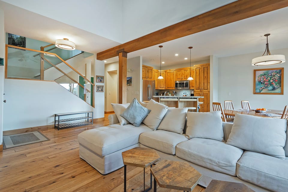 Large open plan great room with real wood fire