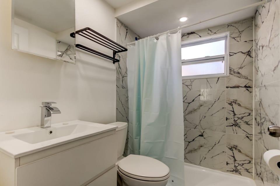Updated Bathroom with Hair Dryer, Shampoo, Conditioner & Body Wash