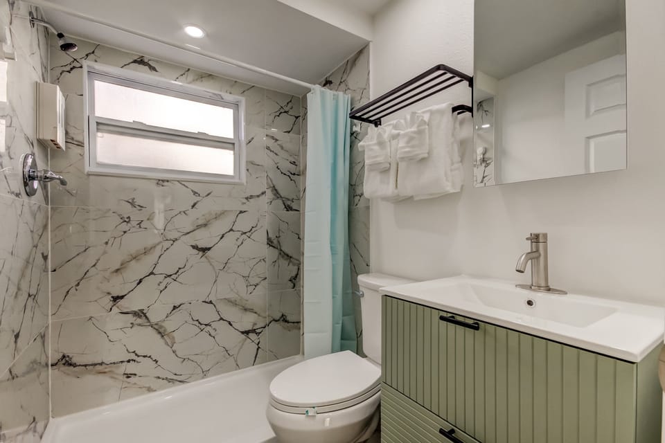 Updated Bathroom with Hair Dryer, Shampoo, Conditioner & Body Wash