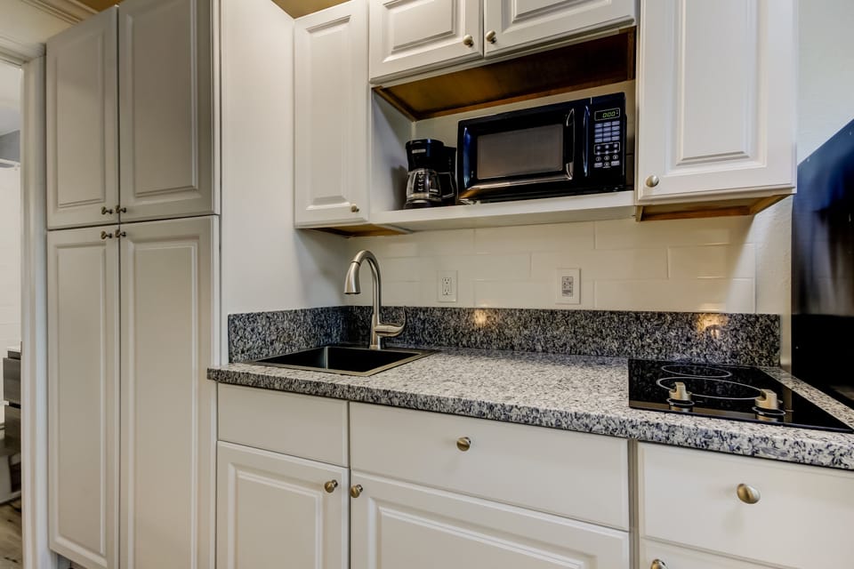 Equipped with Dishes & Pans for a quick meal