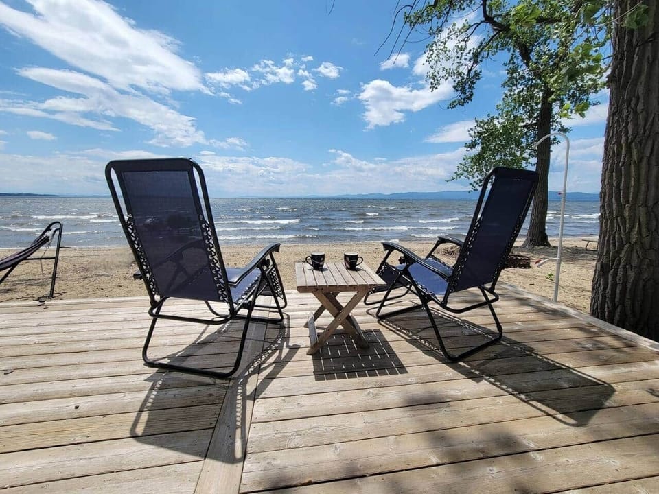 Sixty miles of unobstructed Lake Champlain views from the deck. Including The Green Mountains of Vermont and the Adirondack Mountains of New York. 