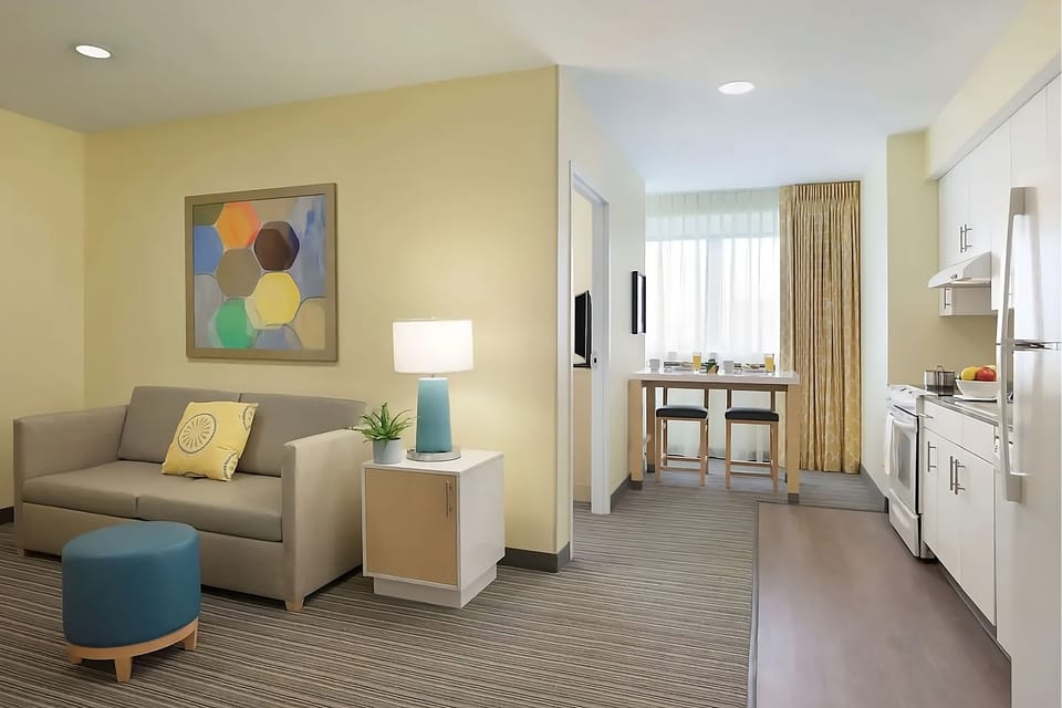 Unwind on the sofa after cooking in your suite.