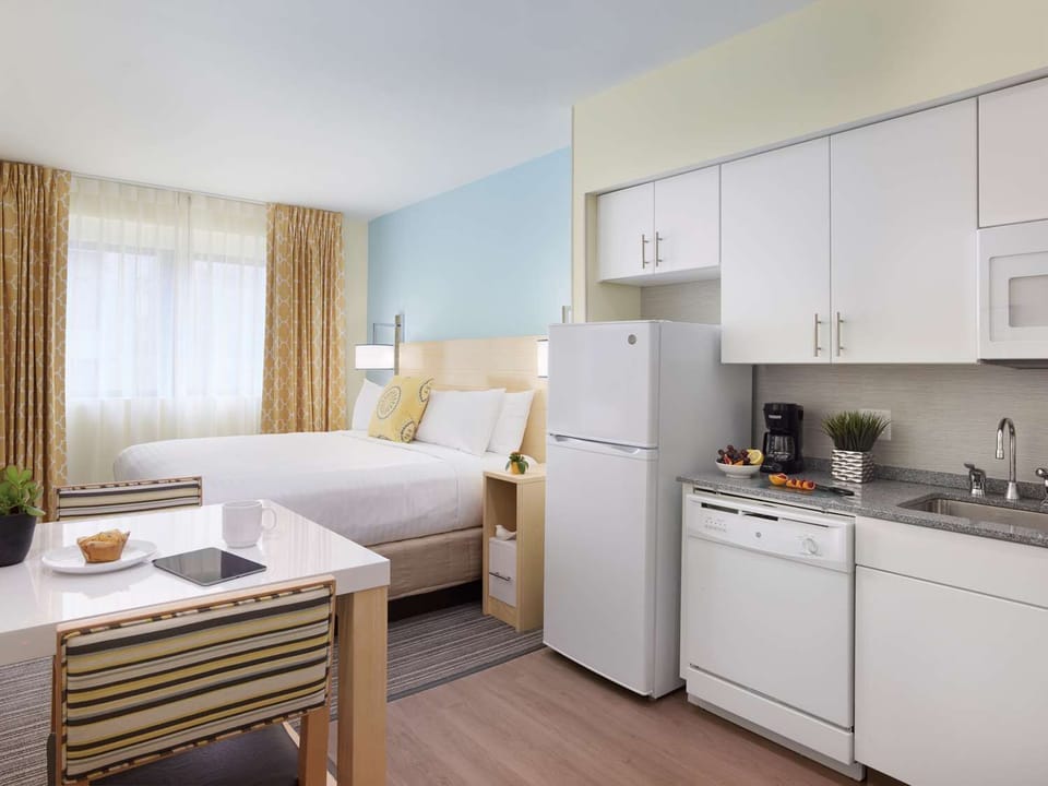 Enjoy easy mornings with a kitchenette steps from the bed